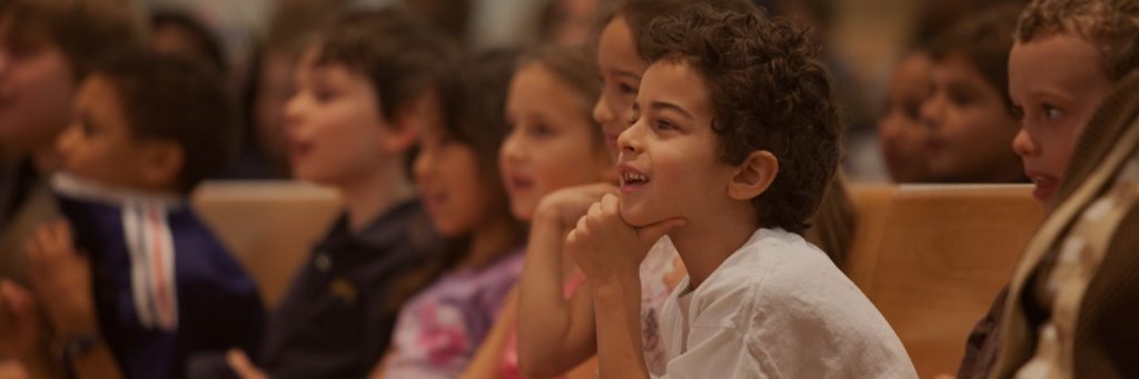 Children smiling in classroom